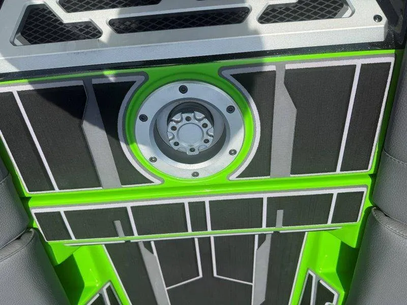 Slide: The Image of Close-up of a modern boat dashboard with bright green and black accents. - 28