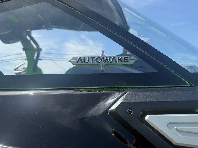 Slide: The Image of Close-up of a boat with an "Autowake" logo on the window. - 26