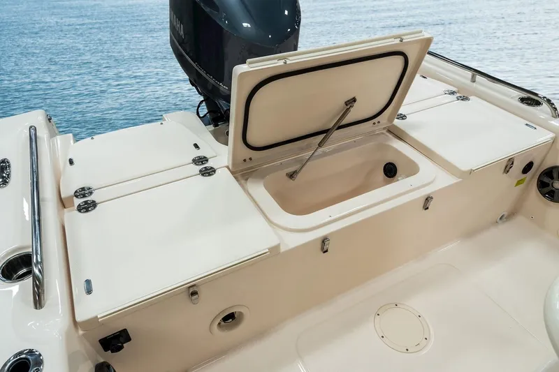 Slide: The Image of Manufacturer Provided Image: 2023 Grady-White 251 Coastal Explorer boat with open storage compartment. - 7