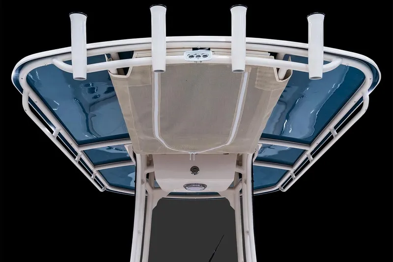 Slide: The Image of Manufacturer Provided Image: 2023 Grady-White 251 Coastal Explorer T-top with rod holders and blue canvas. - 11
