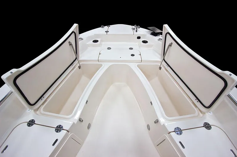 Slide: The Image of Manufacturer Provided Image: 2023 Grady-White 251 Coastal Explorer boat interior with open storage compartments. - 4
