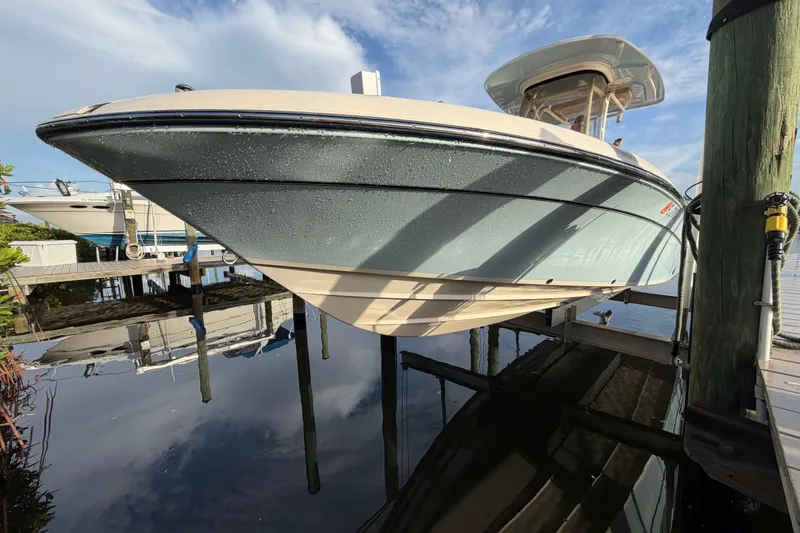 The Image of 2023 Grady-White 251 Coastal Explorer boat docked on a lift. - 0