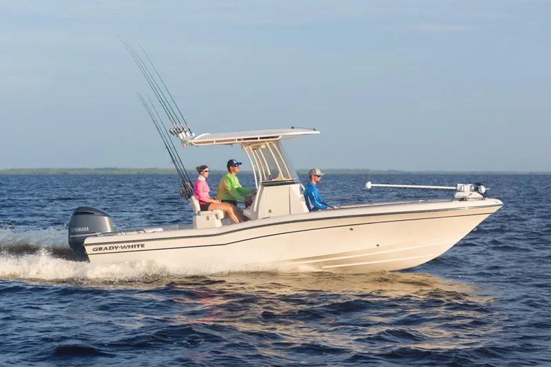 Slide: The Image of Manufacturer Provided Image: 2023 Grady-White 251 Coastal Explorer boat cruising on open water. - 0