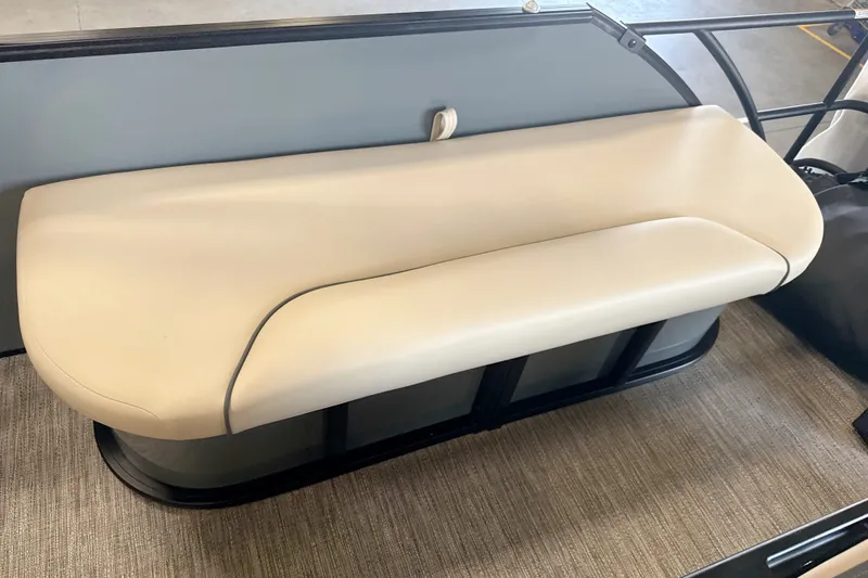 Slide: The Image of 2027 Godfrey Sweetwater 2286 SFL boat seat, beige upholstery, sleek design. - 5