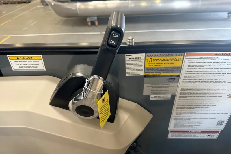 Slide: The Image of Throttle control and capacity warnings on a 2027 Godfrey Sweetwater 2286 SFL boat. - 9