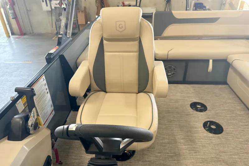 Slide: The Image of Captain's chair on 2027 Godfrey Sweetwater 2286 SFL pontoon boat, beige interior. - 10