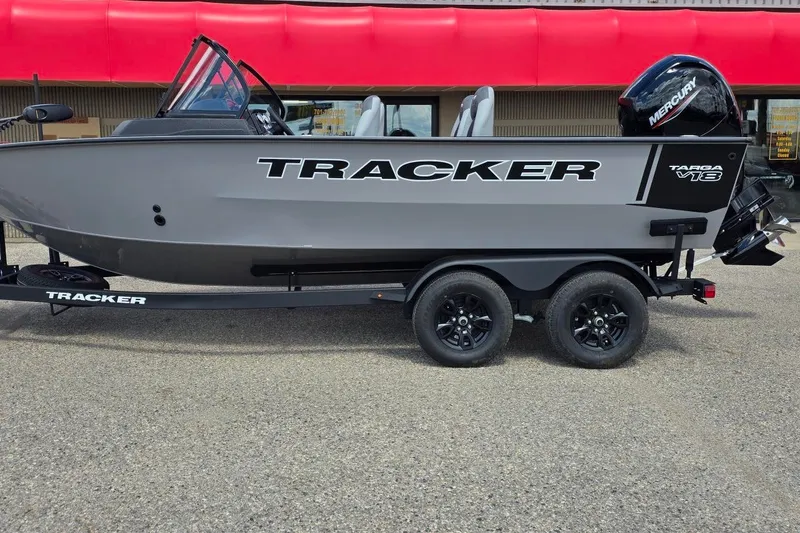 The Image of 2027 Tracker Targa V-18 WT boat on trailer, side view with Mercury engine. - 0