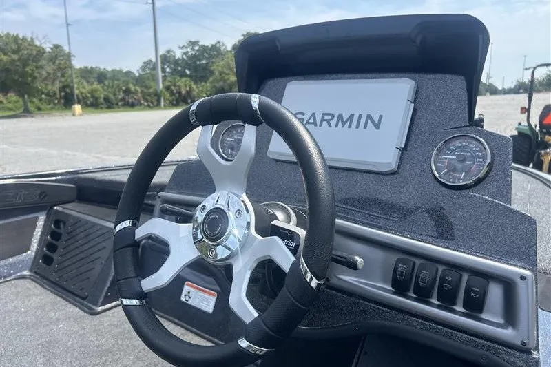 Slide: The Image of Steering wheel and dashboard of 2027 Nitro Z18 XL Pro boat with Garmin display. - 9