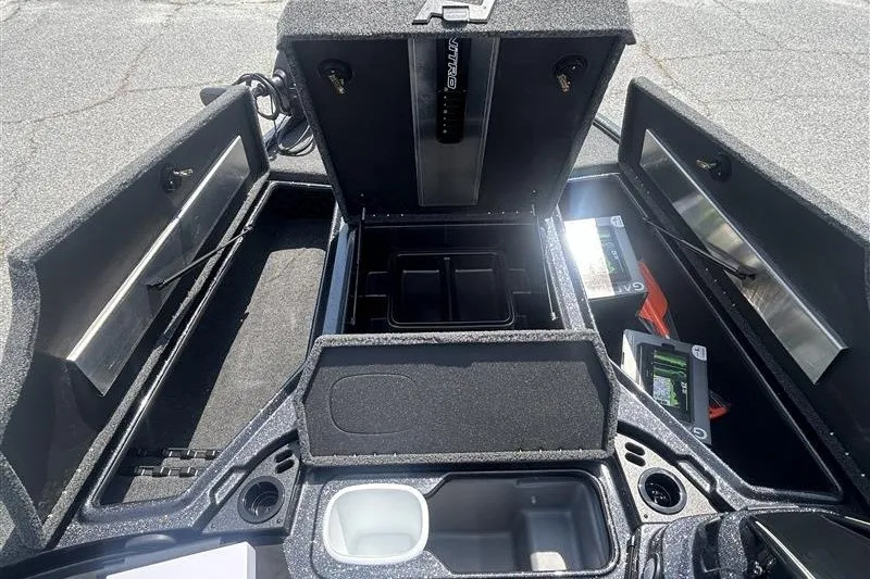 Slide: The Image of Open storage compartments of a 2027 Nitro Z18 XL Pro boat. - 5