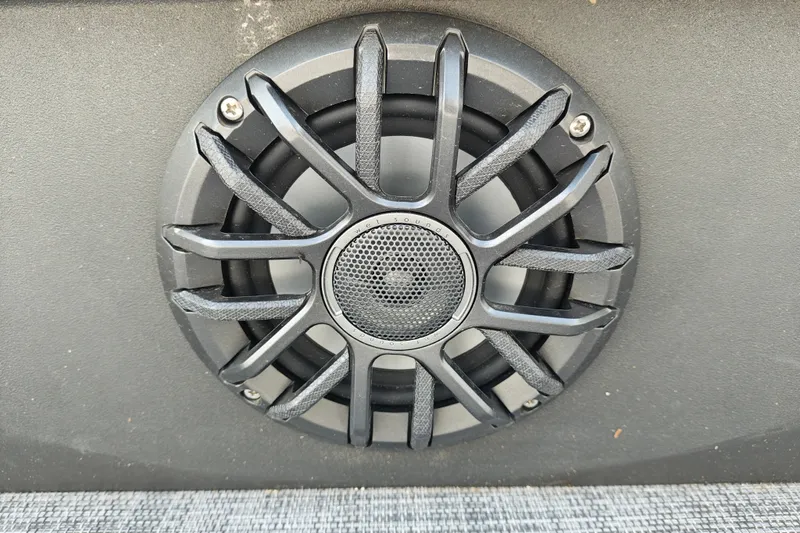 Slide: The Image of Close-up of a speaker on a 2027 Sun Tracker Party Barge 22 DLX. - 21