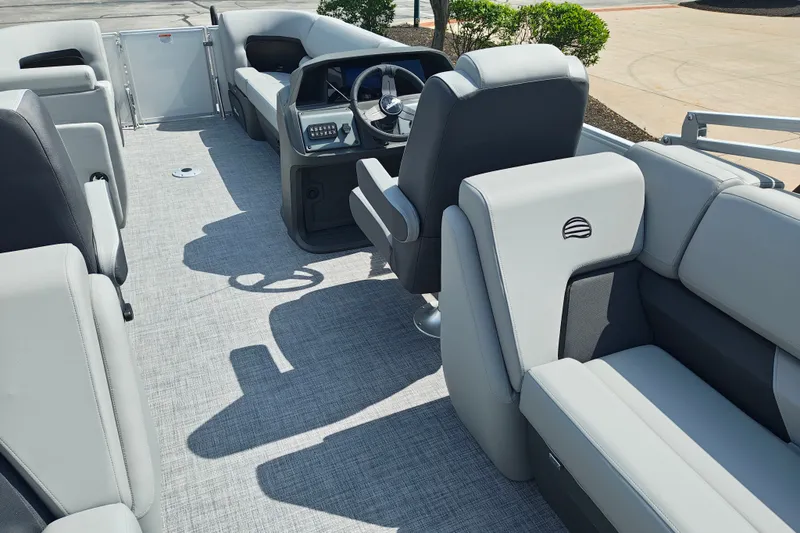 Slide: The Image of Interior of 2027 Sun Tracker Party Barge 22 DLX pontoon boat with gray seating. - 25