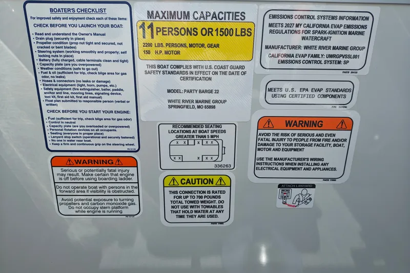 Slide: The Image of Safety and capacity labels on 2027 Sun Tracker Party Barge 22 DLX boat. - 19