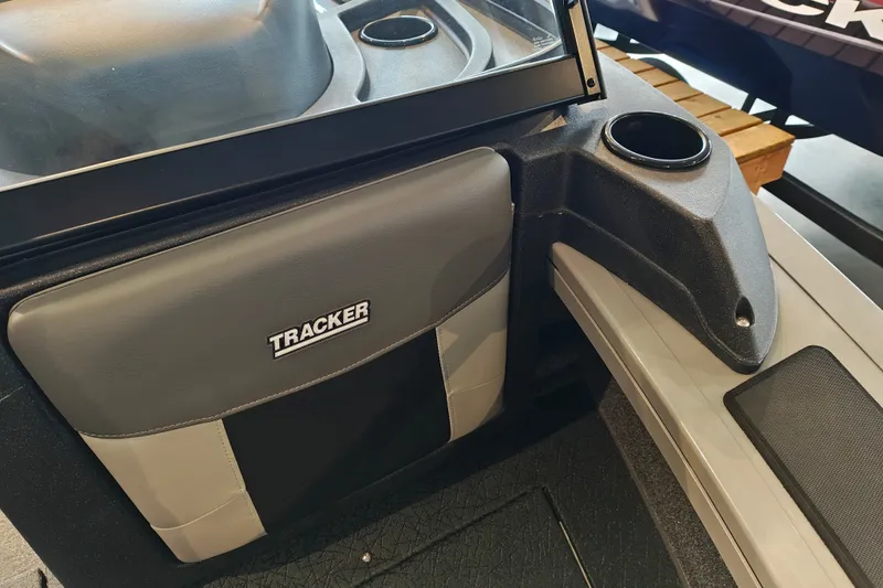 Slide: The Image of 2027 Tracker Targa V-18 WT boat interior with cup holder and branded seating. - 29