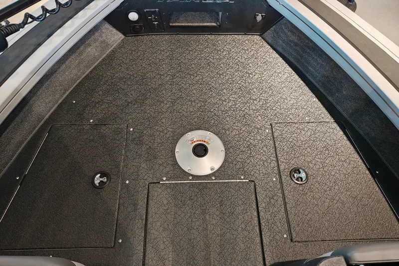 Slide: The Image of Interior view of 2027 Tracker Targa V-18 WT boat deck with storage compartments. - 23