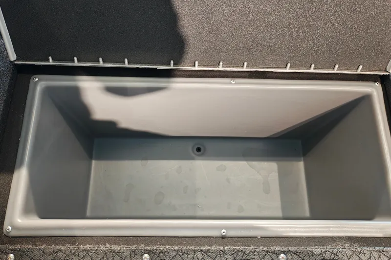 Slide: The Image of Empty storage compartment in 2027 Tracker Targa V-18 WT boat. - 34