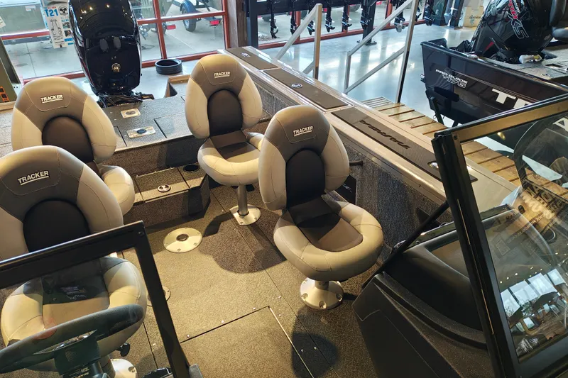 Slide: The Image of 2027 Tracker Targa V-18 WT boat interior with four cushioned seats. - 30