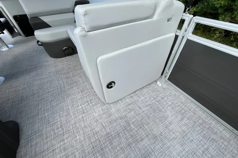 Slide: The Image of 2027 Sun Tracker SportFish 20 DLX boat interior with gray seating and flooring. - 13