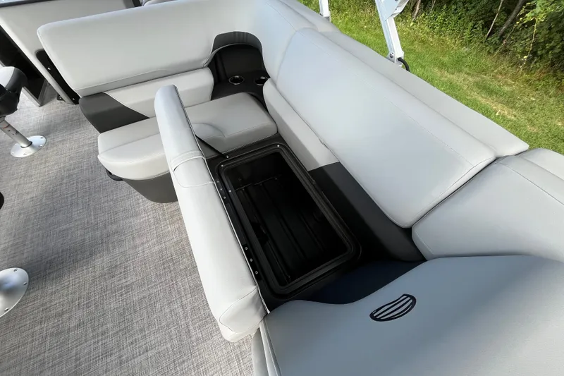 Slide: The Image of 2027 Sun Tracker SportFish 20 DLX boat interior with open storage compartment. - 15