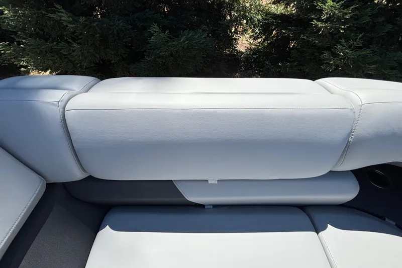 Slide: The Image of 2027 Sun Tracker Party Barge 22 DLX boat seat with gray upholstery. - 39