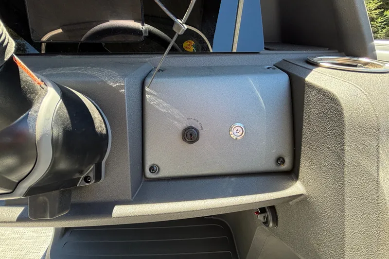 Slide: The Image of Control panel of 2027 Sun Tracker Party Barge 22 DLX pontoon boat. - 51