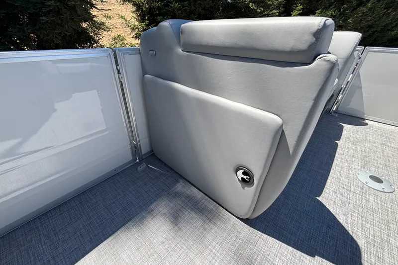 Slide: The Image of 2027 Sun Tracker Party Barge 22 DLX, featuring gray cushioned seating and sleek design. - 50