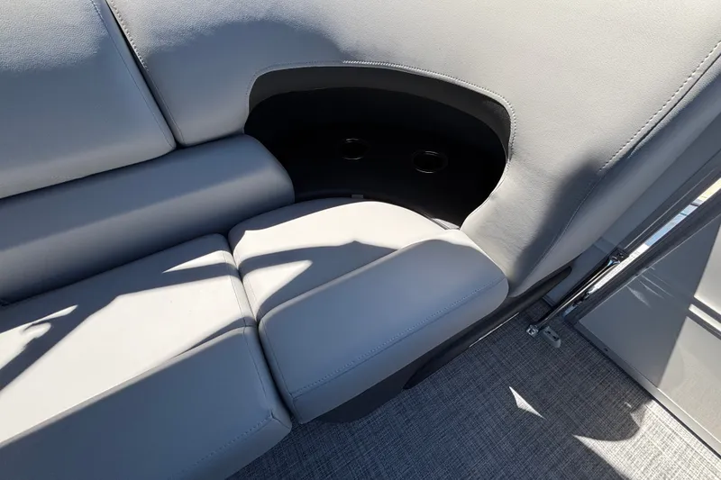 Slide: The Image of Luxurious seating on 2027 Sun Tracker Party Barge 22 DLX with integrated cup holders. - 28