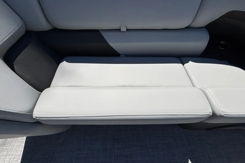 Slide: The Image of 2027 Sun Tracker Party Barge 22 DLX, featuring sleek gray seating. - 29