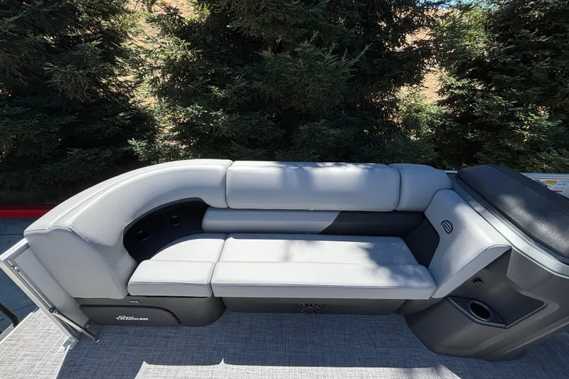 Slide: The Image of 2027 Sun Tracker Party Barge 22 DLX pontoon boat seating area with gray upholstery. - 53