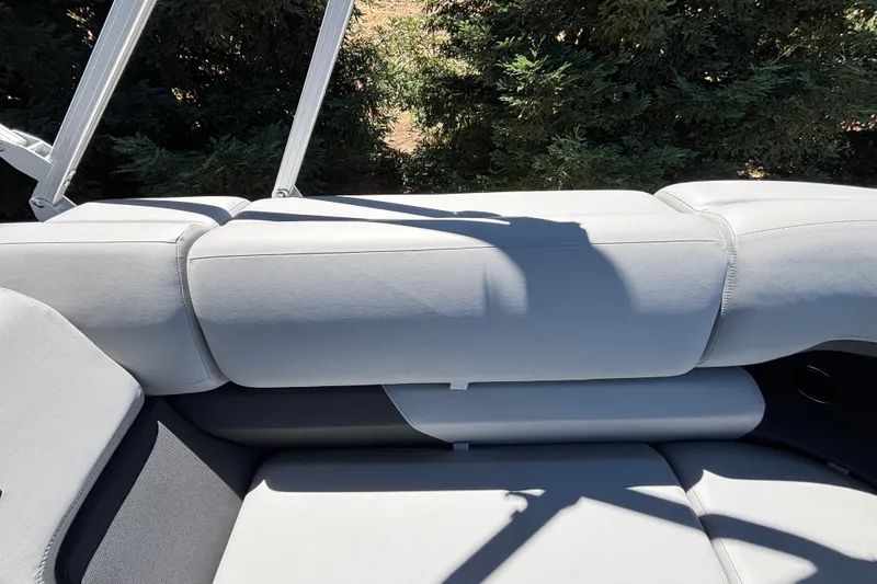 Slide: The Image of 2027 Sun Tracker Party Barge 22 DLX boat seating with gray upholstery. - 34