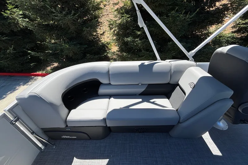 Slide: The Image of 2027 Sun Tracker Party Barge 22 DLX with comfortable gray seating and sleek design. - 48