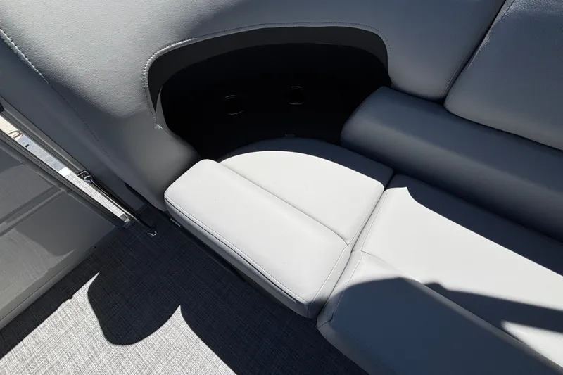 Slide: The Image of Sun Tracker Party Barge 22 DLX 2027, featuring sleek gray seating and modern design. - 36