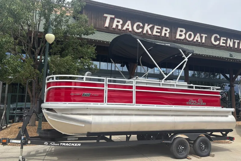 The Image of 2027 Sun Tracker SportFish 20 DLX pontoon boat on trailer at Tracker Boat Center. - 0