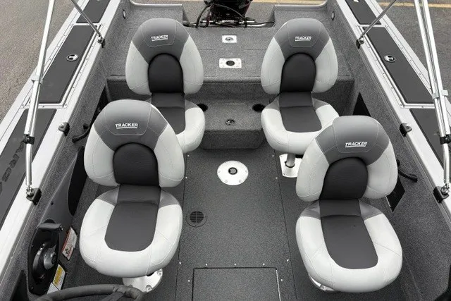 Slide: The Image of 2027 Tracker Targa V-18 WT boat interior with four cushioned seats. - 19