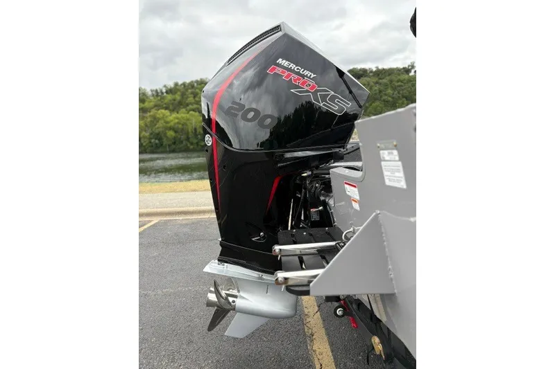 Slide: The Image of Outboard motor on 2027 Tracker Targa V-18 WT boat, featuring Mercury Pro XS 200. - 13
