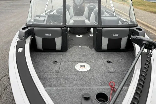 Slide: The Image of 2027 Tracker Targa V-18 WT boat interior with seating and fishing deck. - 18