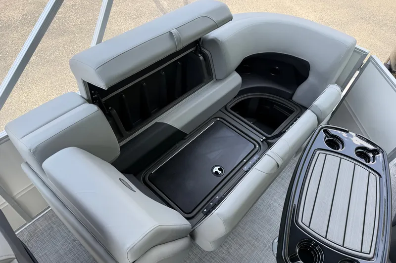 Slide: The Image of 2027 Sun Tracker Party Barge 22 DLX interior seating and storage area. - 20