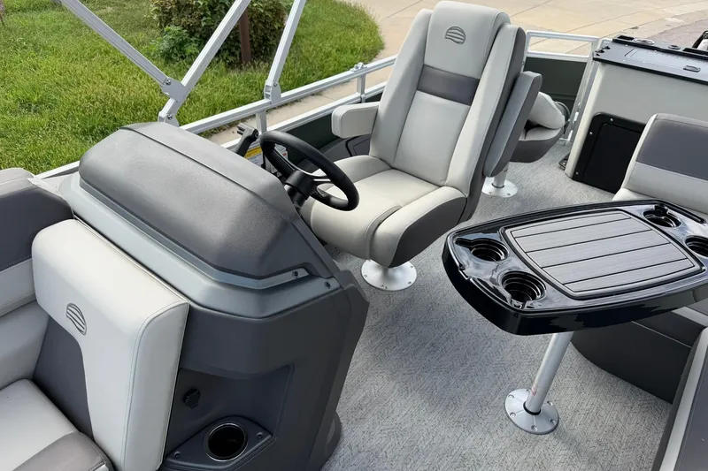 Slide: The Image of Interior of 2027 Sun Tracker Fishin' Barge 22 DLX with seating and table. - 18