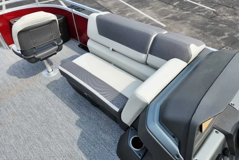 Slide: The Image of 2027 Sun Tracker Fishin' Barge 22 DLX interior with comfortable seating and modern design. - 13
