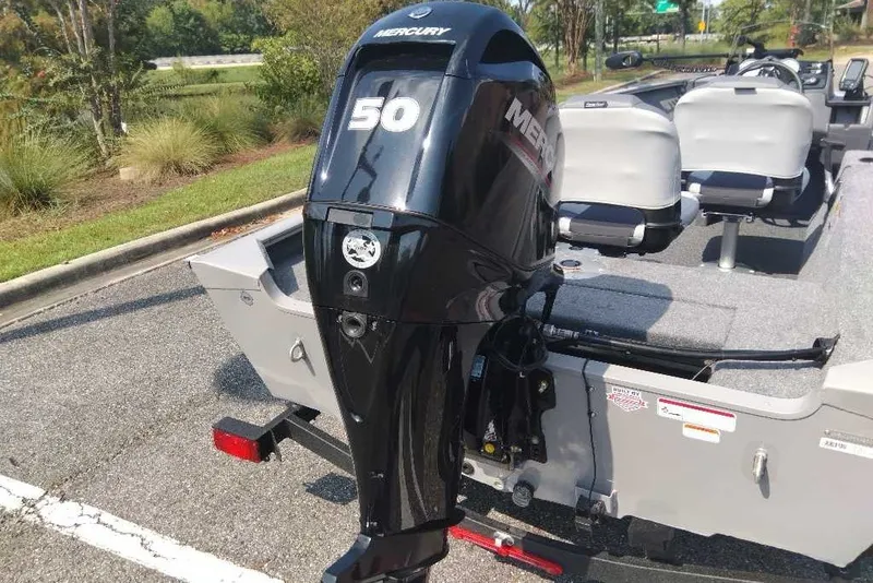 Slide: The Image of 2027 Tracker Super Guide V-16 SC boat with Mercury 50 outboard motor. - 13