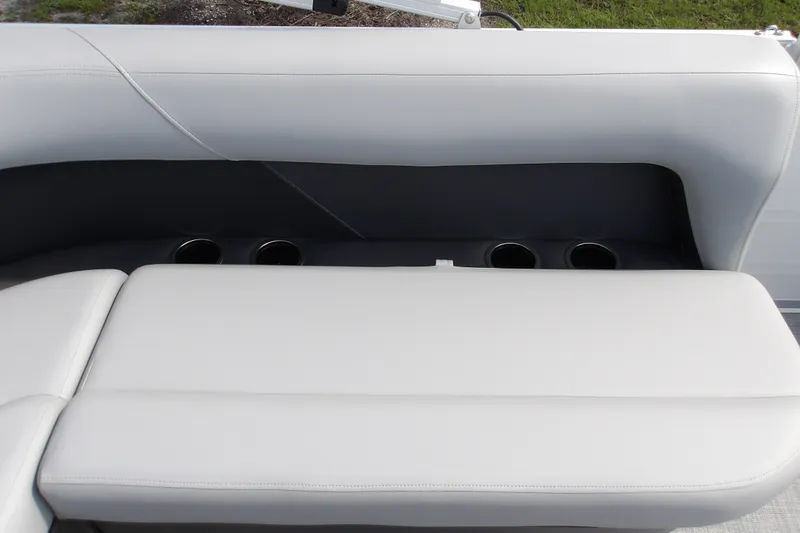 Slide: The Image of Sun Tracker Party Barge 16 DLX 2027 interior seating with cup holders. - 15