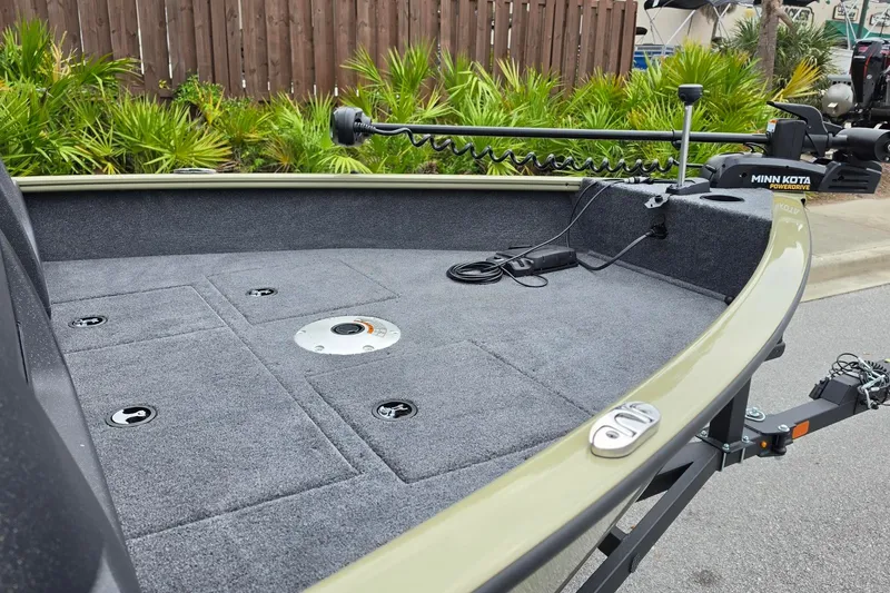 Slide: The Image of 2027 Tracker Pro Guide V-16 WT boat deck with Minn Kota PowerDrive trolling motor. - 16