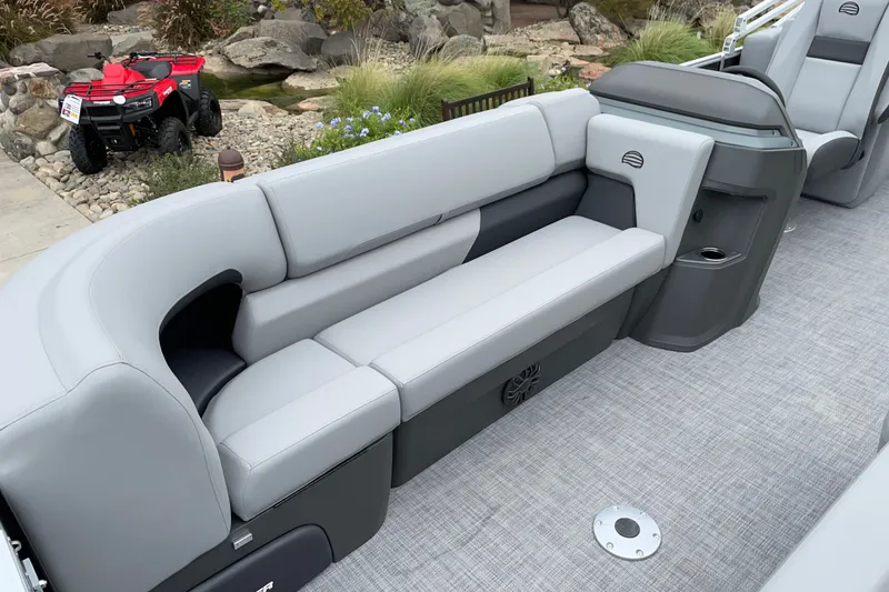 Slide: The Image of 2027 Sun Tracker Party Barge 22 DLX interior with gray seating and modern design. - 13