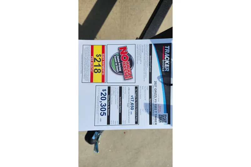 Slide: The Image of 2027 Tracker Grizzly 1553 Timber price sheet with monthly payment details. - 38