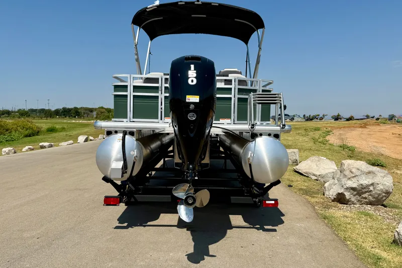 Slide: The Image of 2027 Sun Tracker Fishin' Barge 22 DLX pontoon boat with powerful outboard motor. - 16