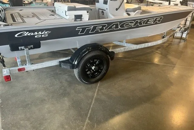 The Image of 2027 Tracker Bass Tracker Classic CC boat on trailer in showroom. - 0