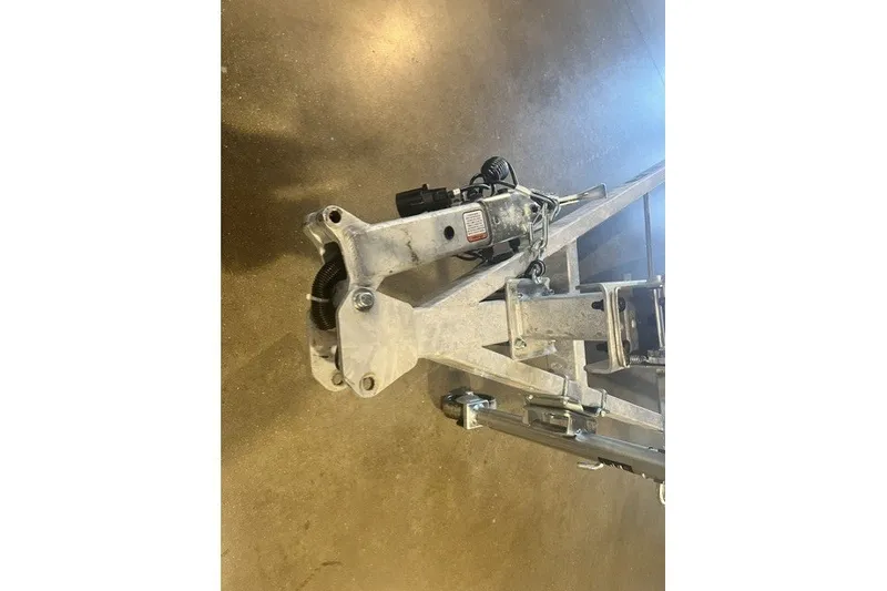 Slide: The Image of Trailer hitch of 2027 Tracker Bass Tracker Classic CC on a concrete floor. - 49