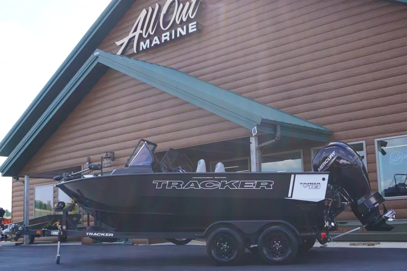 The Image of 2027 Tracker Targa V-18 WT boat displayed outside All Out Marine store. - 1