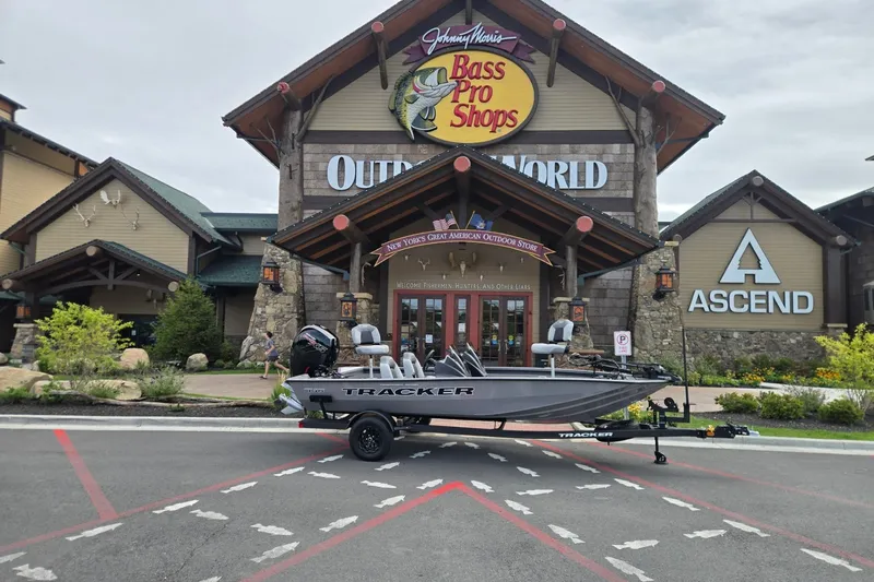 The Image of 2027 Tracker Pro Team 195 boat displayed outside Bass Pro Shops Outdoor World. - 0