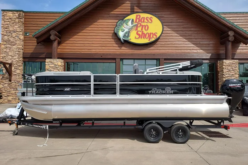 The Image of 2027 Sun Tracker Party Barge 22 DLX pontoon boat at Bass Pro Shops. - 0
