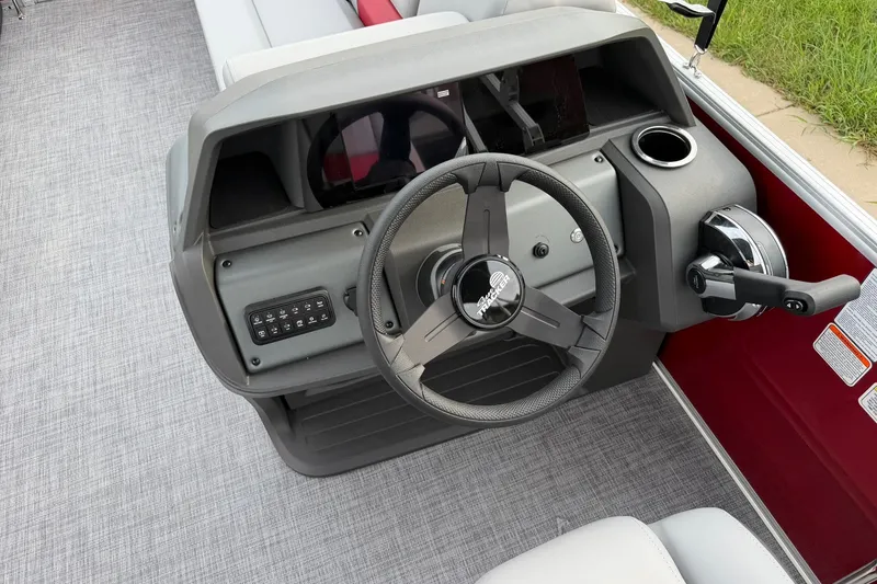 Slide: The Image of Steering console of 2027 Sun Tracker Party Barge 20 DLX pontoon boat. - 16